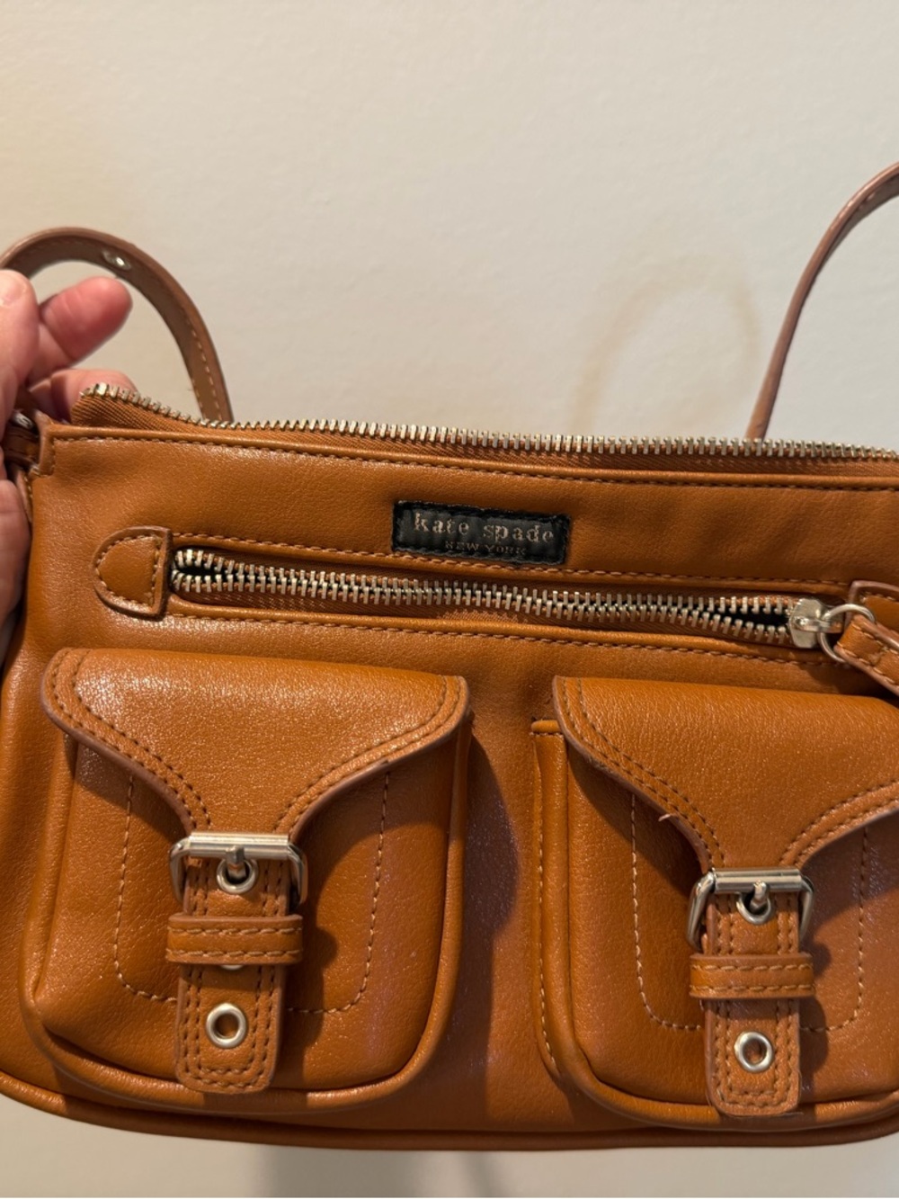 kate spade tan leather crossbody with dual front buckle pockets